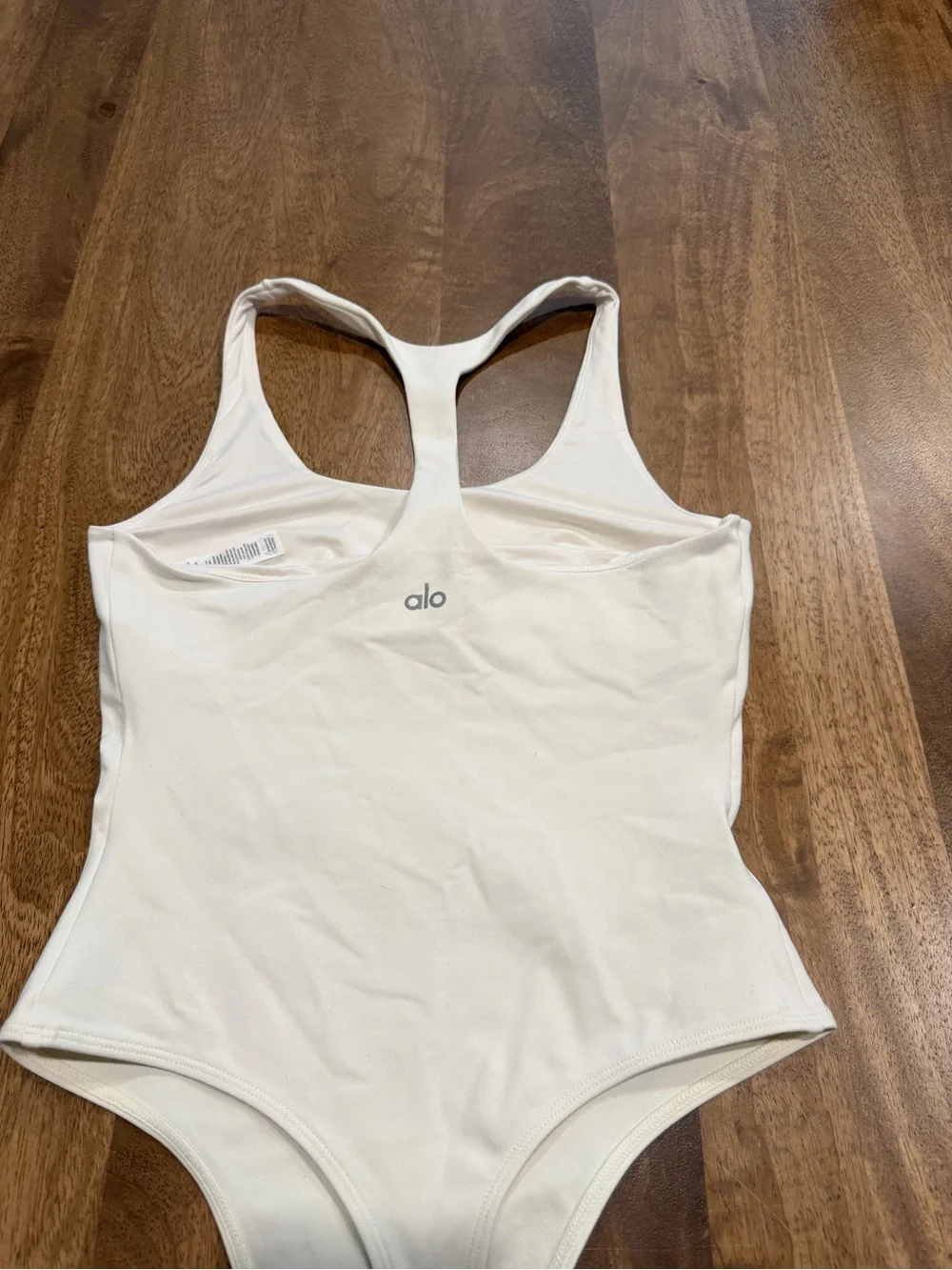 ALO Yoga White Racerback One-Piece Bodysuit